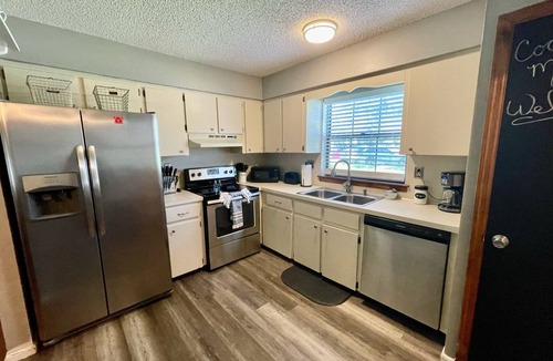 Brooksville House | Cozy Coachlight Village Getaway- Entire townhome w/private parking and yard.