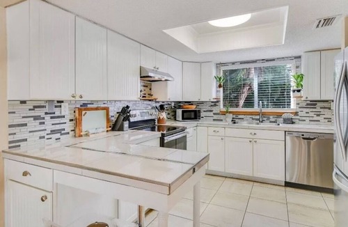 New Smyrna Beach House | Cozy family sized beach house! Short Walk to the Atlantic Ocean
