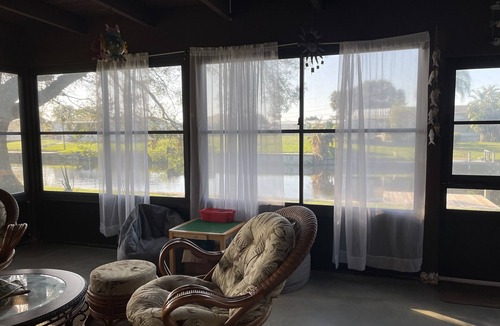Taylor Creek House | Cozy Water Front 2 bedroom 2 bathroom Home with Lake Access and fenced backyard.