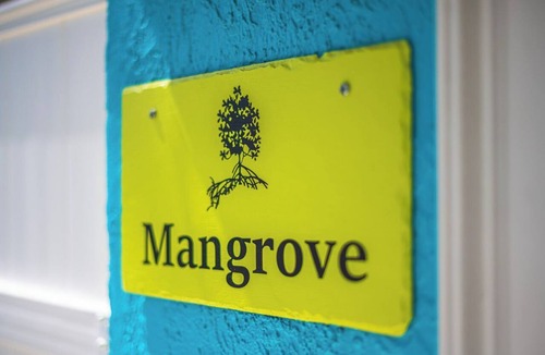 Historic Downtown Melbourne Apartment | Crane Creek Inn Mangrove Suite: Waterfront Pool!
