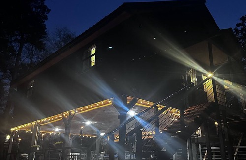 Hattiesburg House | Creek-side getaway, big deck, easy access to the city while being off the grid!
