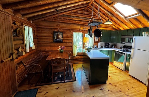 Forest Beach Cabin | Dancing Bear Cabin: Authentic storybook log cabin with Lake Michigan views