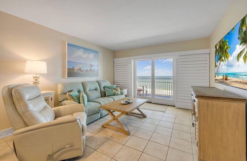 New Smyrna Beach Condo | Direct oceanfront 2/2 with private balcony, heated beachfront pool, and beach access
