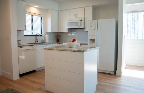 Holiday Isle Condo | Directly on the beach! 2 beach chairs and 1 umbrella provided!