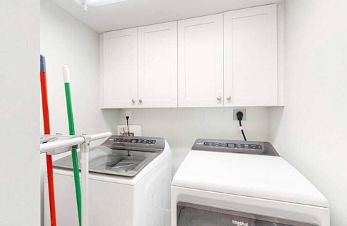 Isles of Capri Condo | Dog-friendly duplex with a patio, deck, washers, dryers, & central AC