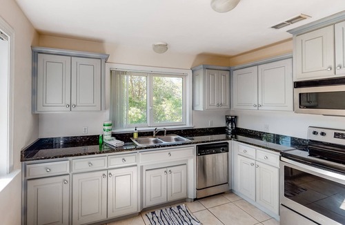 Eastpoint House | Dog-friendly home with lovely water view, roomy deck, fast WiFi, central AC, W&D