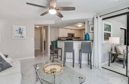 East Naples House | Dog-friendly lakefront home with hot tub, gazebo, firepit, outdoor kitchen, W/D
