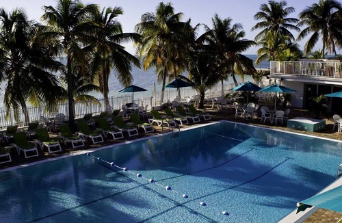 Key Colony Beach House | Dog-Friendly Waterfront House with 37ft Dock and Cabana Beach Club & Pool