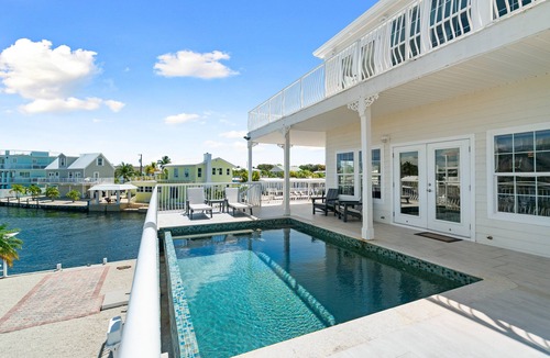 Cross Key Waterways House | Dolphin Paradise: Pool, Elevator, Waterfront with Dock