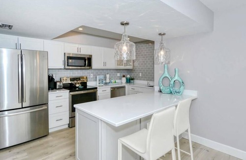 Siesta Key House | Doveplum 121- 2 Story, 2 Bedroom Condo with Private Beach with lounge chairs & umbrella provided,.