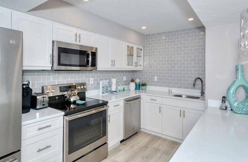 Siesta Key House | Doveplum 121- 2 Story, 2 Bedroom Condo with Private Beach with lounge chairs & umbrella provided,.
