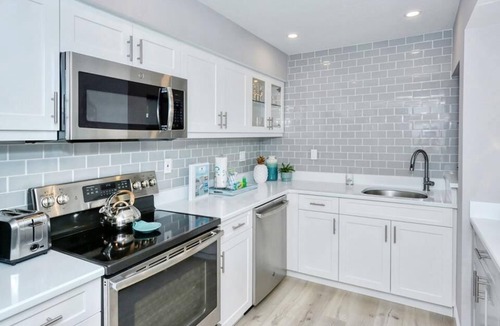 Siesta Key House | Doveplum 121- 2 Story, 2 Bedroom Condo with Private Beach with lounge chairs & umbrella provided,.