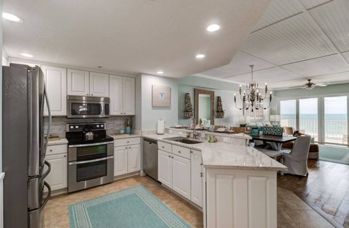 Daytona Beach Shores Apartment | Elegant Oceanfront Pool Hot Tub at Sanibel Condos