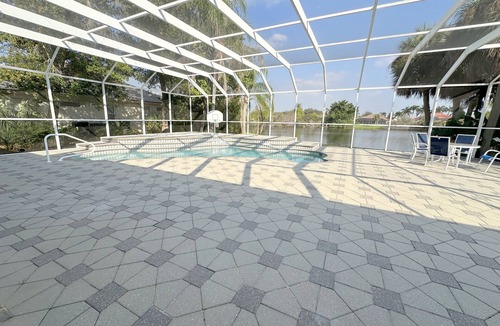 Riverwood House | Elegant Port Charlotte Oasis: 3BR/3BA Home with Private Heated Pool & Pond View