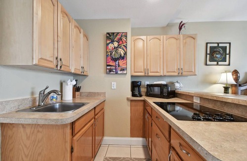 Bay Esplanade Apartment | Enchanted Inn Suite #6: Waterfront, Pool, Fishing Dock, Boat Docks & Tiki Bar!