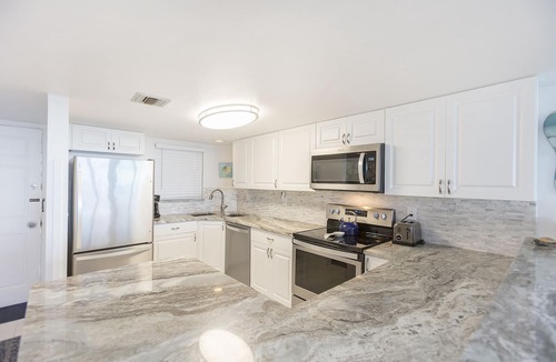 Daytona Beach Shores Condo | END OF SUMMER SPECIALS! Quiet Beachside Condo-Pickleball-Heated Pool-Fitness Rm
