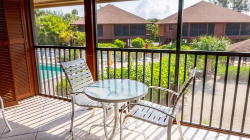 Sanibel House | Enjoy pool views from your Sanibel Island Villa - Private Beach - Pet Friendly - Signal Inn 04