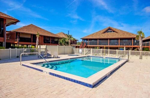 Sanibel House | Enjoy pool views from your Sanibel Island Villa - Private Beach - Pet Friendly - Signal Inn 04
