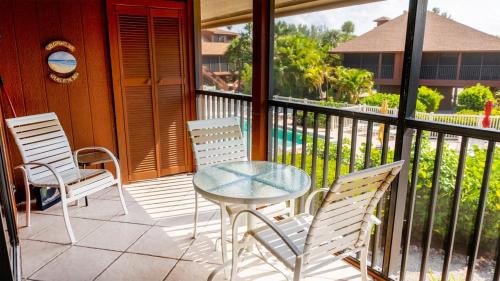 Sanibel House | Enjoy pool views from your Sanibel Island Villa - Private Beach - Pet Friendly - Signal Inn 04