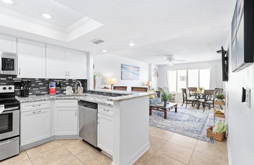 Daytona Beach Shores Condo | Enjoy stunning ocean views from the balcony, living room, dining area, and kitchen. This 2BR condo features a heated beachfront pool, fitness room, king beds in both bedrooms, and comfortably sleeps 4 in beautiful Daytona Shores.