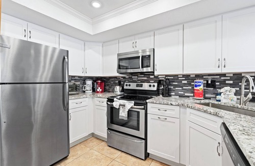 Daytona Beach Shores Condo | Enjoy stunning ocean views from the balcony, living room, dining area, and kitchen. This 2BR condo features a heated beachfront pool, fitness room, king beds in both bedrooms, and comfortably sleeps 4 in beautiful Daytona Shores.