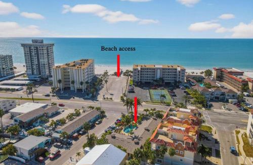 Redington Shores Apartment | Enjoy Sunny Days by the Pool and Beautiful Sunset Beach Walks at Coconut Villa's Suite 10!