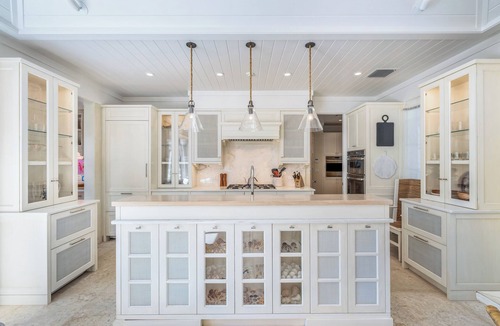 Boca Grande House | Experience luxury in this spacious 4-bedroom, 5-bathroom single-family home with a pool.