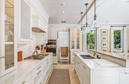 Boca Grande House | Experience luxury in this spacious 4-bedroom, 5-bathroom single-family home with a pool.
