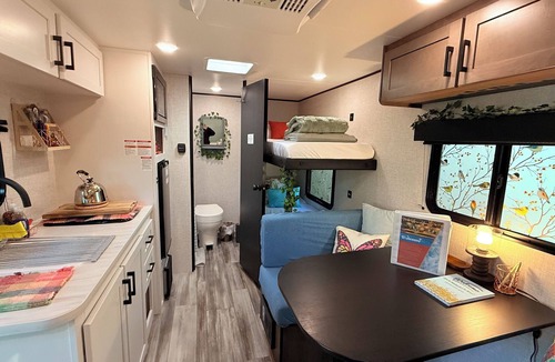 Goldenrod House | Experience the charm of East Winter Park with a cozy glamping RV.