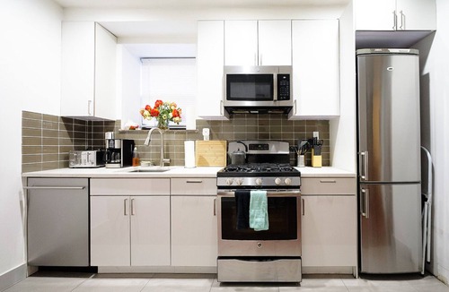 Upper Manhattan Apartment | Family-Friendly Duplex Near Subway | Patio + Games