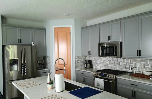 St. Johns House | Family home in Beachwalk with roomy common areas and private spaces for a group.