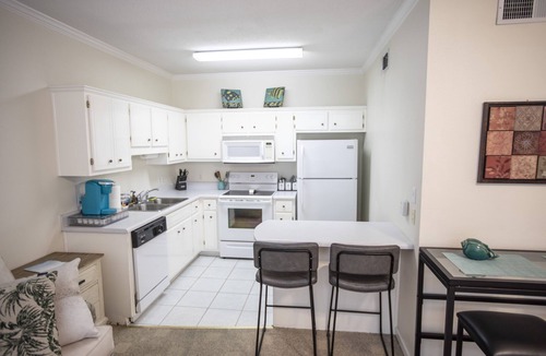 Scenic Gulf Drive Condo | Family/pet friendly, pool on-site, 5 min walk to beach, & popular dinning