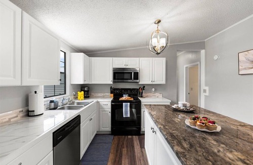 Butler Beach House | Family Retreat w/Fire Pit, walk to Crescent Beach, Pets welcome