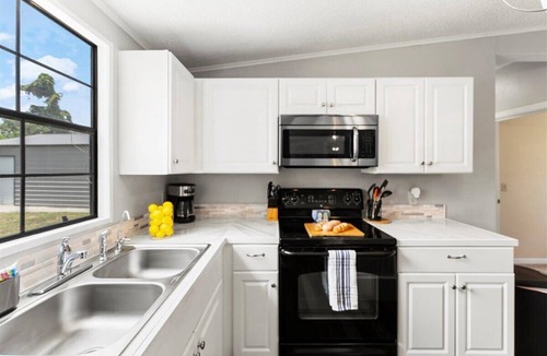 Butler Beach House | Family Retreat w/Fire Pit, walk to Crescent Beach, Pets welcome
