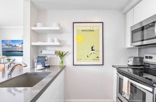 Coconut Grove Apartment | Major international sporting event Prep: Grove Luxe Balcony & Bay View