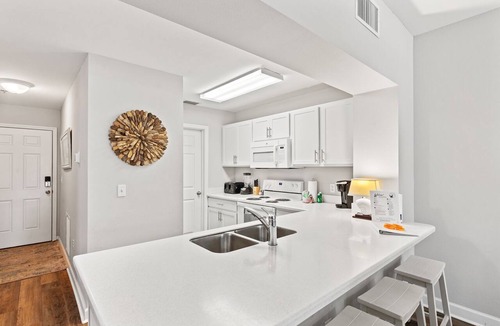 Waterside Village Condo | First Floor Condo Walk to Beach Sleeps 4