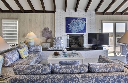 Stone Harbor House | FRIDAY TO FRIDAY RENTAL. Enjoy the beautiful sunsets - Large 2nd floor deck with pretty water views and great awnings to block the warm afternoon sun.