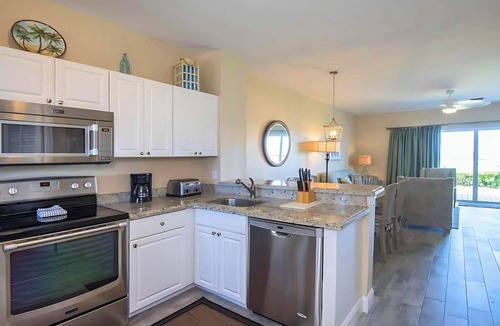 Marathon Hotel | Full Kitchen for Homemade Meals and a Tropical Pool Just Outside your Door!