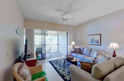 Bonita Bay Condo | Gated resort community condo with water views, pool, hot tub, & balcony