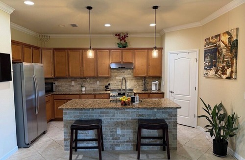 Gran Paradiso House | Gated Tuscan Paradise: 4BR/3BA Home + Lagoon Pool, Tennis & Fitness Club Access
