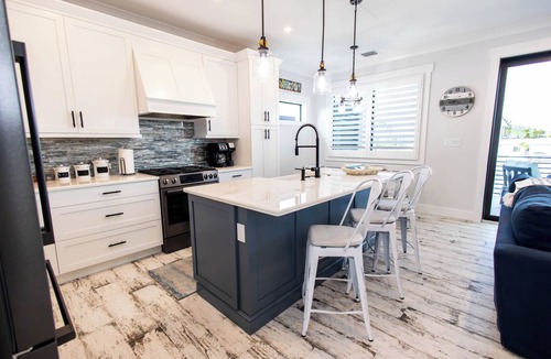 Cudjoe Gardens House | Gorgeous new build on Cudjoe Marina Basin with 80 ft boat dock and private pool
