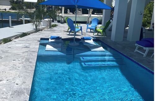 Cudjoe Gardens House | Gorgeous new build on Cudjoe Marina Basin with 80 ft boat dock and private pool