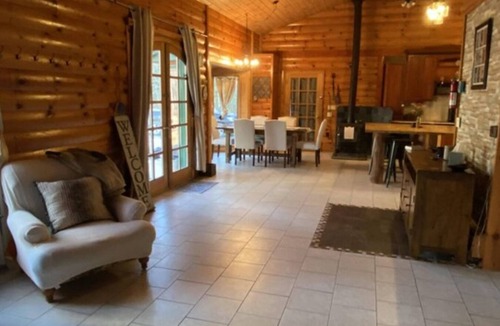 Arenac County Cabin | Gorgeous, Secluded Large Log 4 Bedroom Cabin with a pond view on several acres!