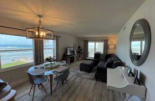 New Smyrna Beach Condo | Gorgeous Sunrise View from this Direct Ocean Front/Corner Unit!