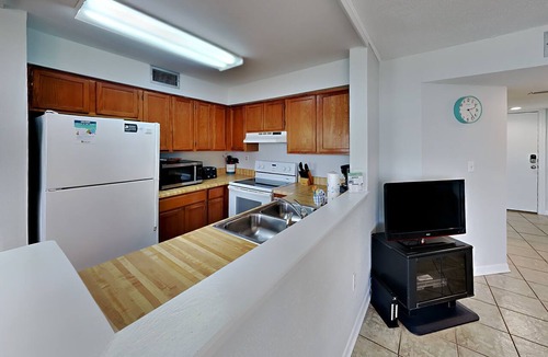 Pensacola Beach Condo | Great Location Right on the Water – Large Community Pool!