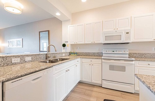 Naples Condo | Greenlinks/Lely: Updated Coastal Condo w/Office space-Lake/Golf Views-Resort Amenities