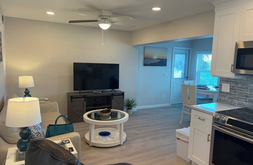 Englewood Condo | Ground floor Bay front, heated pool, dock, private beach access onsite.