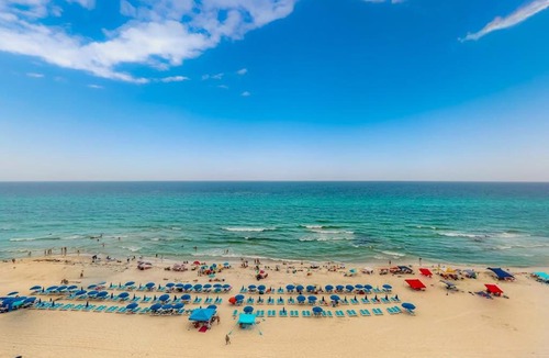 Miramar Beach House | Gulf-front penthouse condo with pool hot tub fitness room & beach access