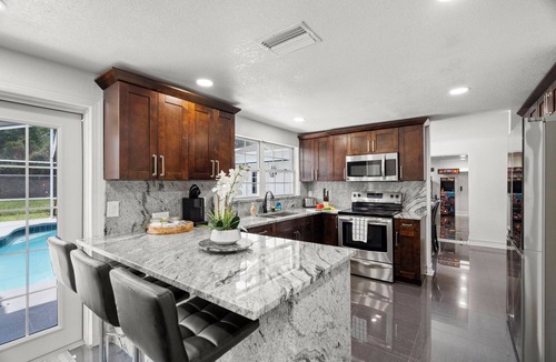 Tampa House | Heated Pool+ AMAZING NEW GAME ROOM! + Fire Pit, Outdoor TV - 5 bedrooms
