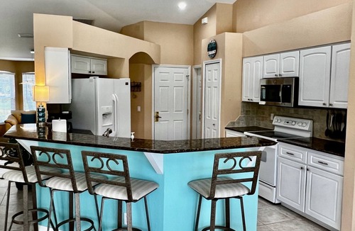 Pelican House | Heated Pool home in the Rose Garden Tarpon Point area!